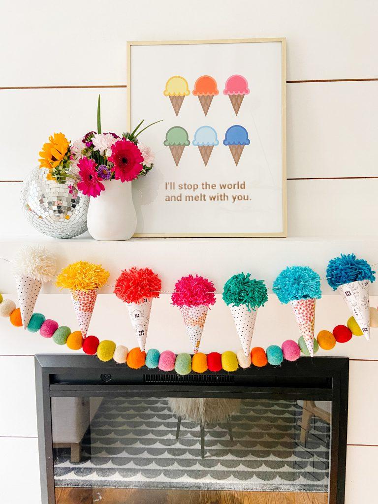 Welcome Home Saturday by popular Alabama lifestyle blog, She Gave It A Go: image of a pom pom ice cream cone garland and felt garland hanging from a fireplace mantle. 